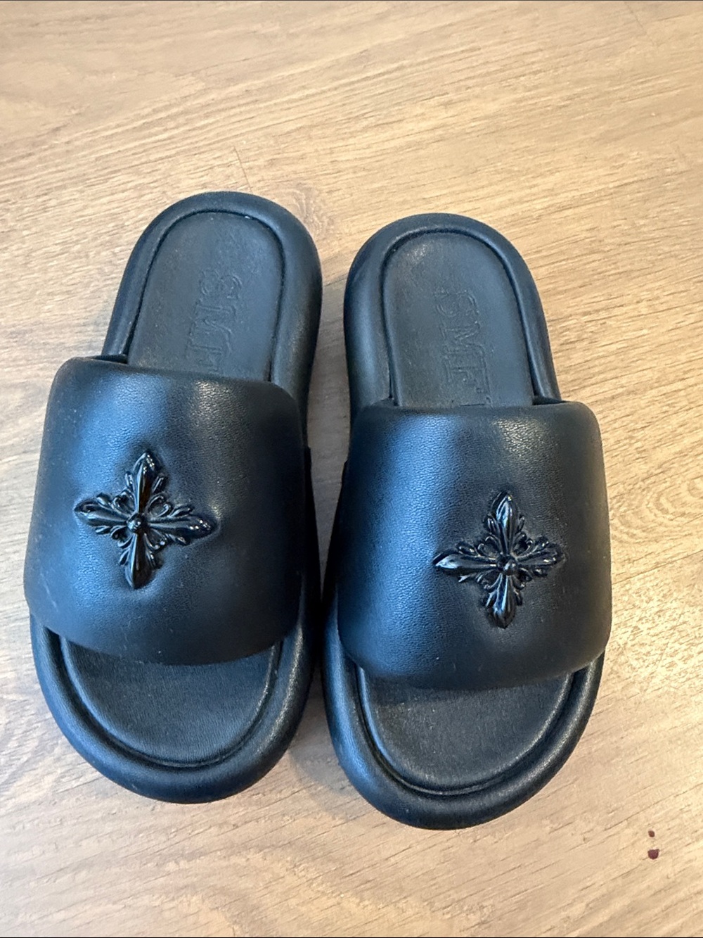 SMFK black leather slippers